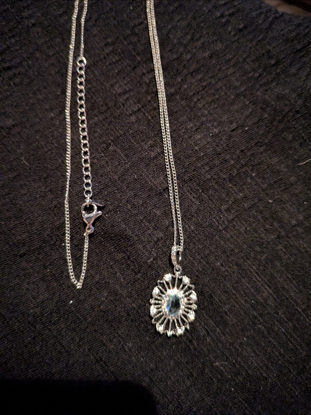 Silver Floral Sunburst Pendant Necklace with Blue Center